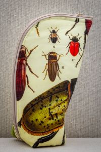 estuche escarbajo lado derecho